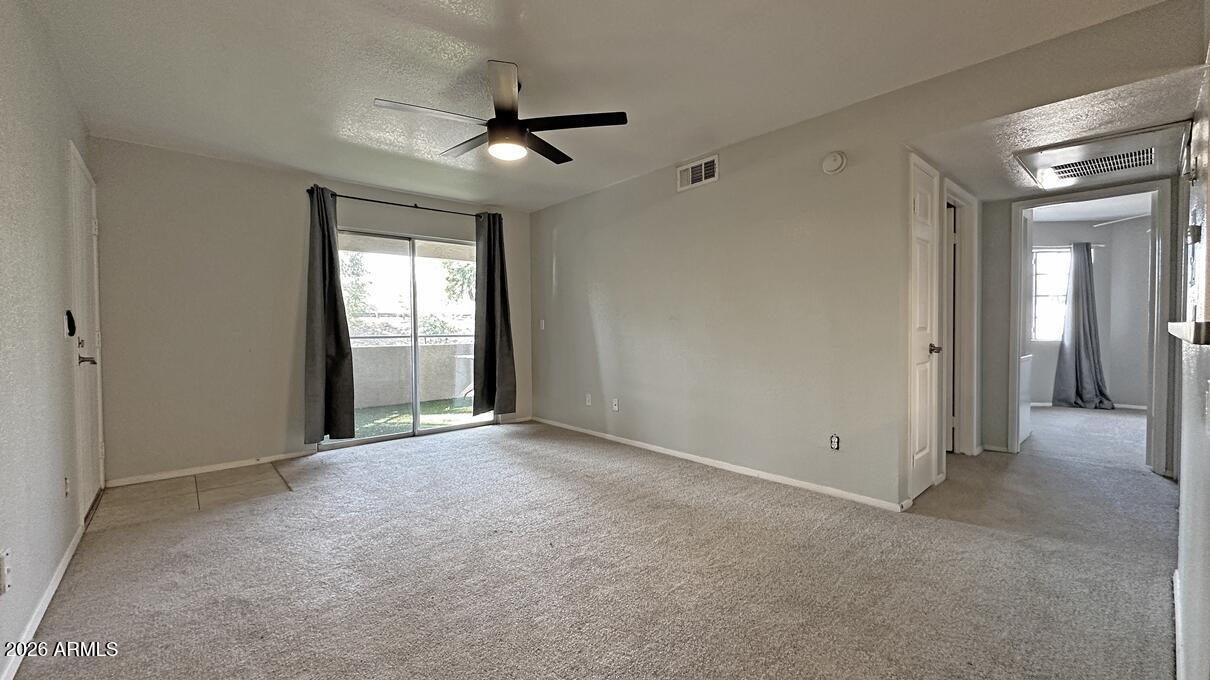 1720 East Thunderbird Road, Unit 2095 Phoenix, AZ 85022 - Photo 14 of 22 a view of an empty room with a window
