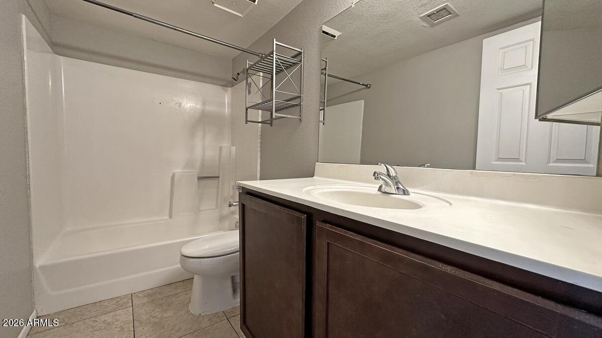 1720 East Thunderbird Road, Unit 2095 Phoenix, AZ 85022 - Photo 4 of 22 a bathroom with a sink a toilet and shower