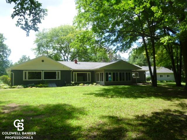 7722 Big Hand Road Columbus, MI 48063 - Photo 2 of 47 overlooking the wooded setting