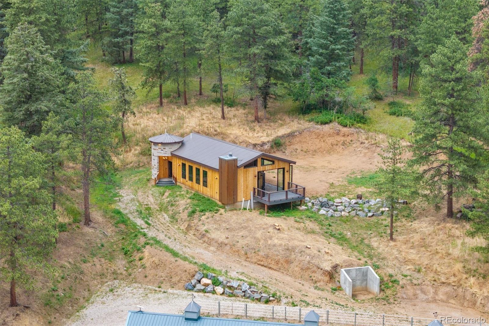 10013 McKinney Road Littleton, CO 80127 - Photo 36 of 50 front view of a house with a yard