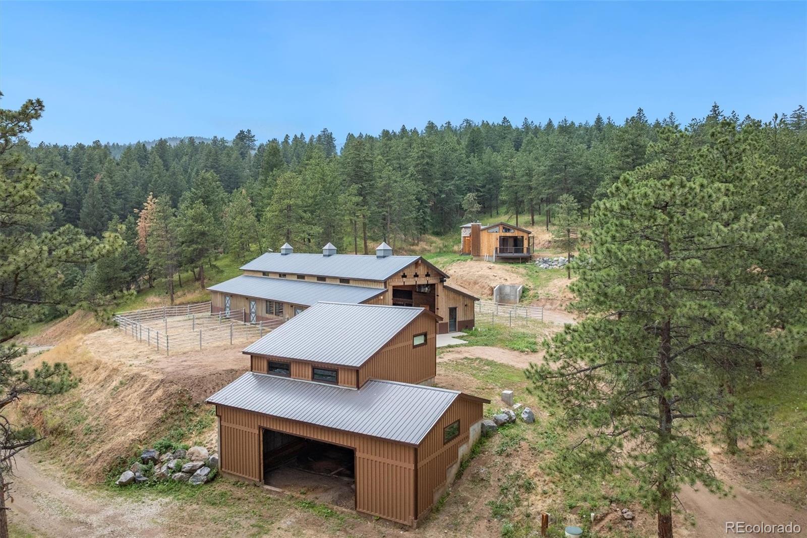10013 McKinney Road Littleton, CO 80127 - Photo 40 of 50 an aerial view of a house with a yard