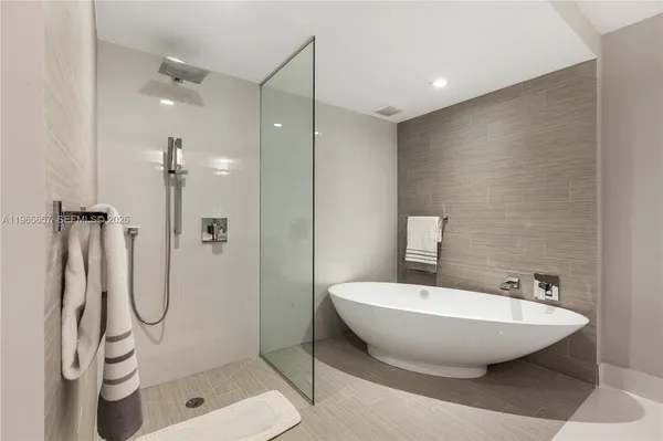 a bathroom with a sink and shower