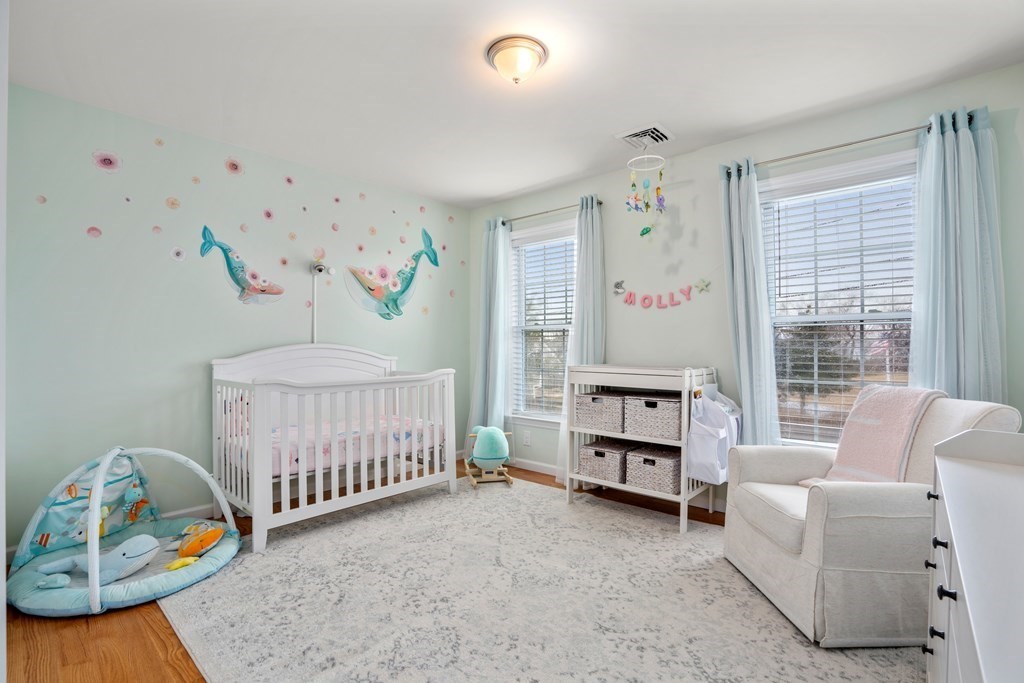 106 Colonial Road Marshfield, MA 02050 - Photo 20 of 42 a bedroom with furniture and a window
