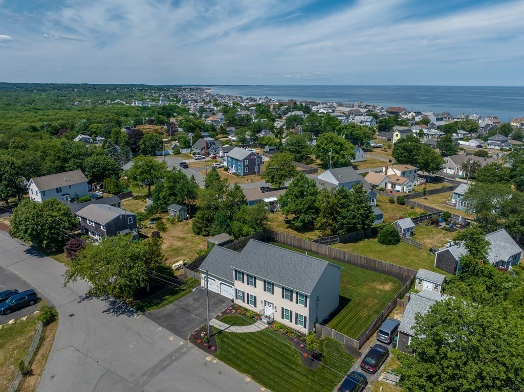 106 Colonial Road Marshfield, MA 02050 - Photo 39 of 42 an aerial view of a house with a garden