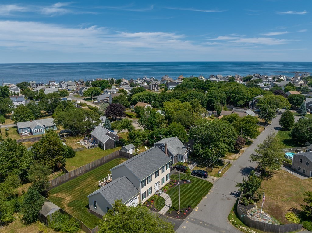 106 Colonial Road Marshfield, MA 02050 - Photo 40 of 42 an aerial view of a house with a garden