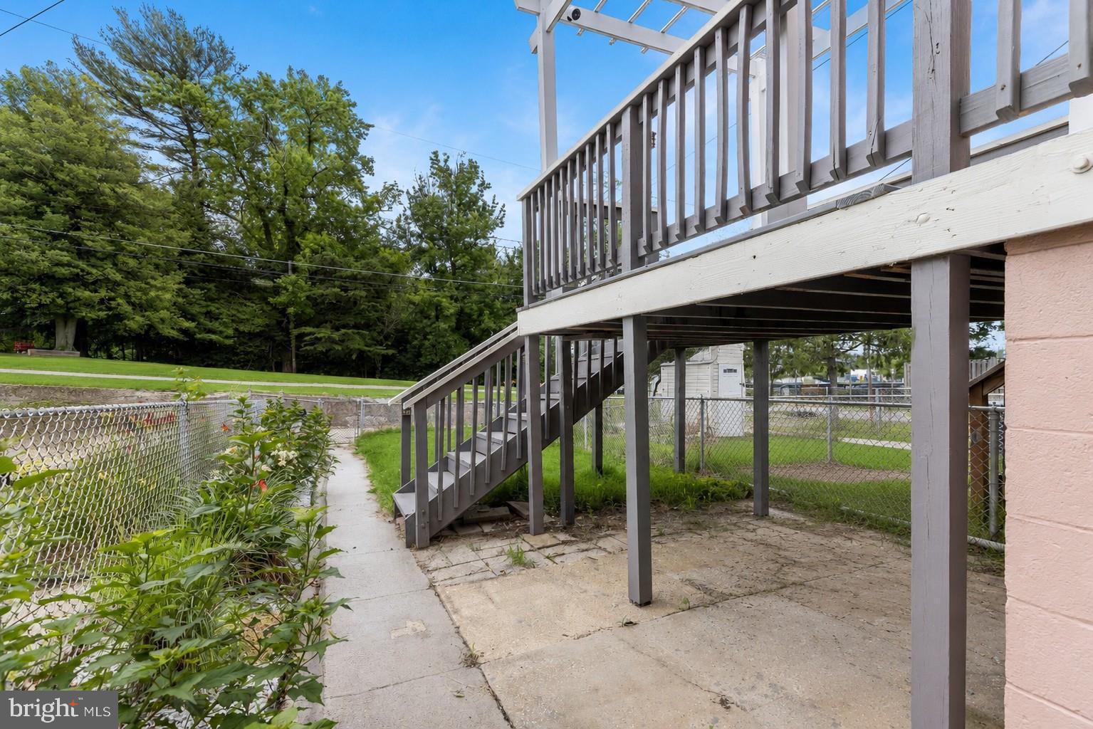 309 Leeanne Road Baltimore, MD 21221 - Photo 37 of 42 Fenced Rear Lawn and Under Deck Storage
