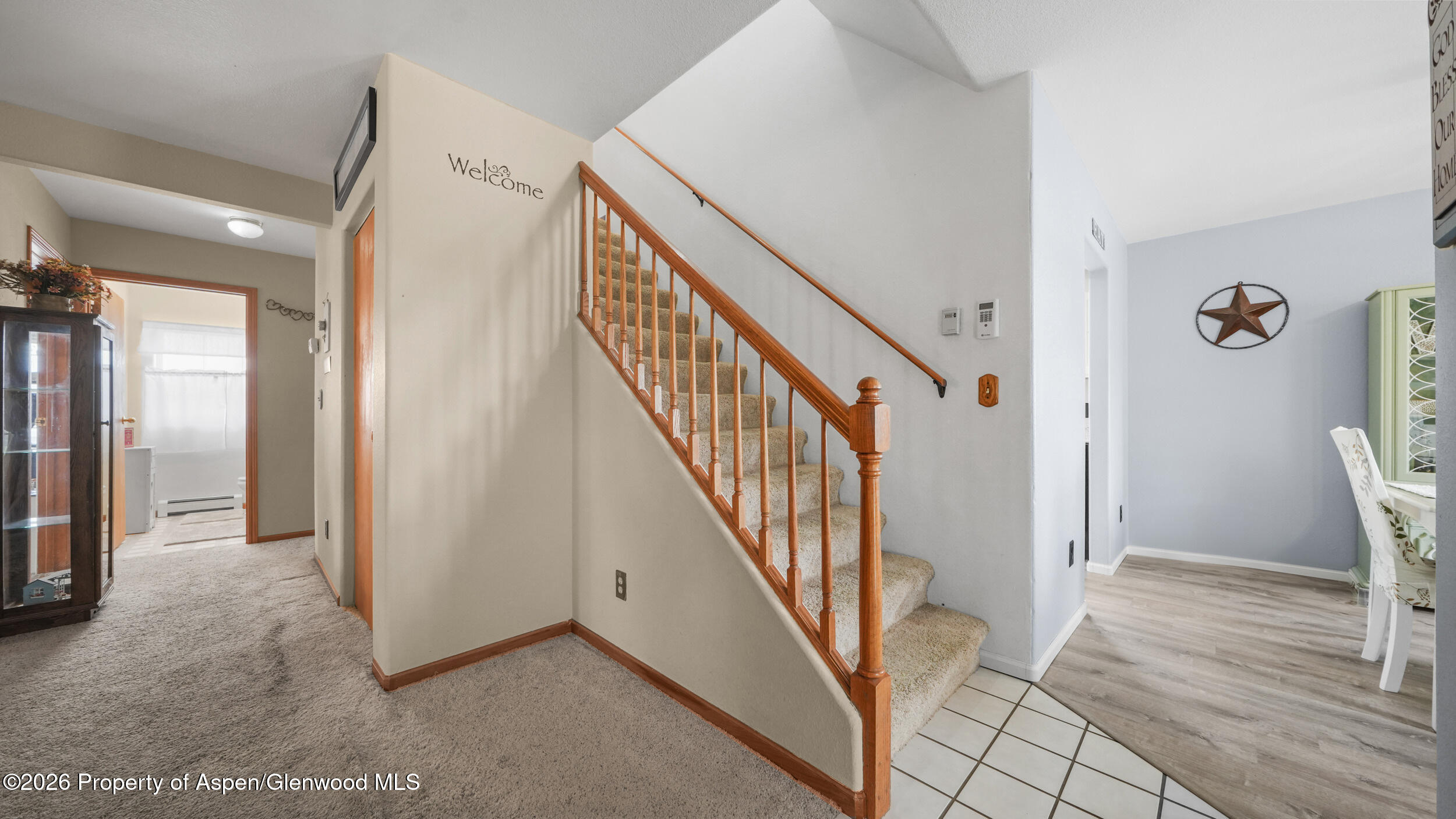 2750 East Avenue Rifle, CO 81650 - Photo 18 of 35 a view of a hallway with wooden floor and entryway