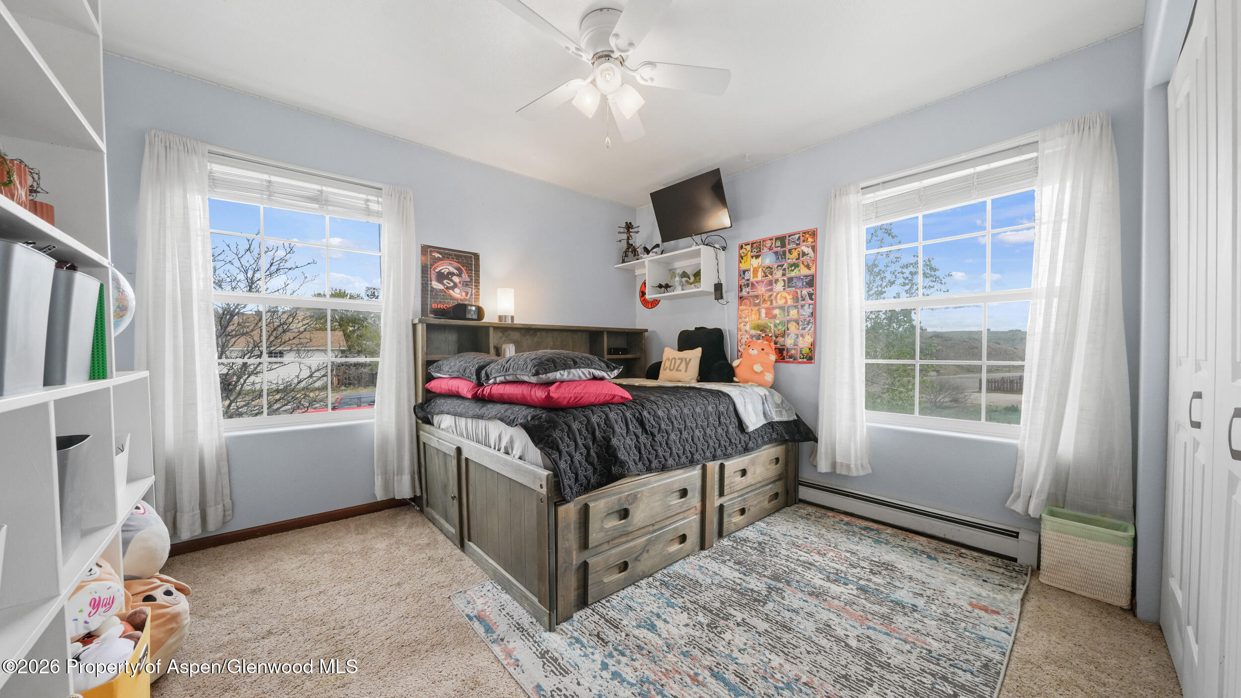 2750 East Avenue Rifle, CO 81650 - Photo 24 of 35 a bedroom with bed and a window