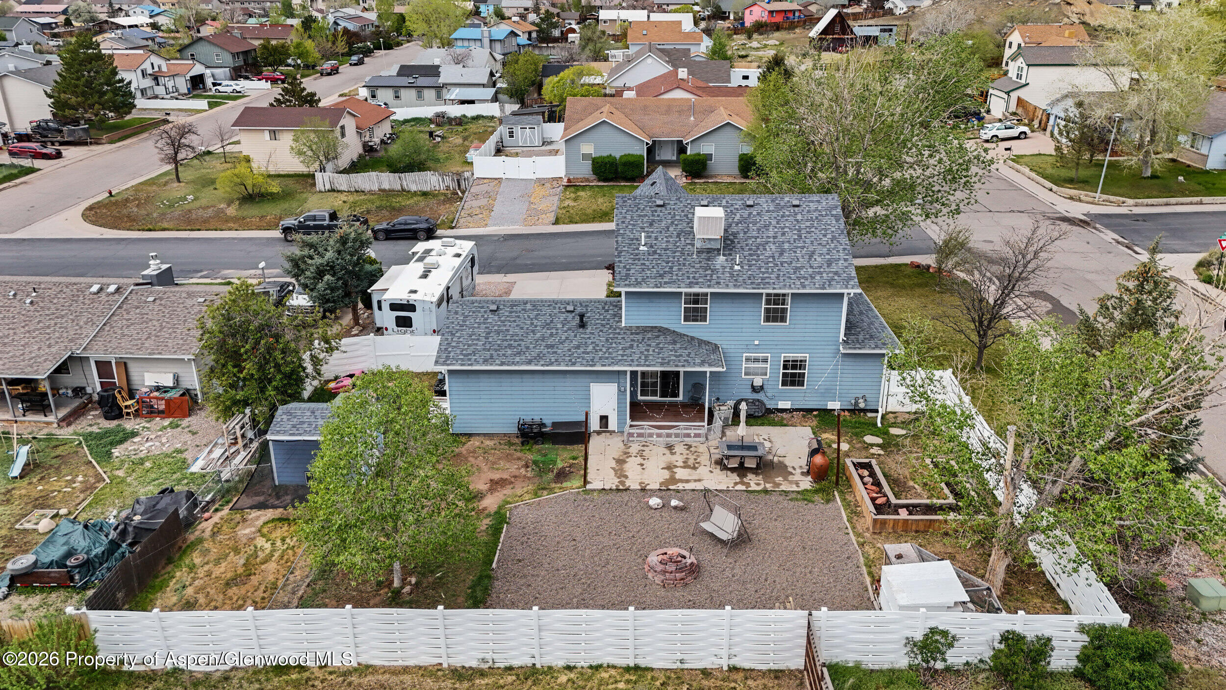 2750 East Avenue Rifle, CO 81650 - Photo 35 of 35 an aerial view of residential houses with outdoor space and parking