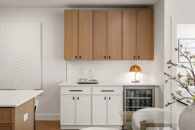 a view of cabinets and window