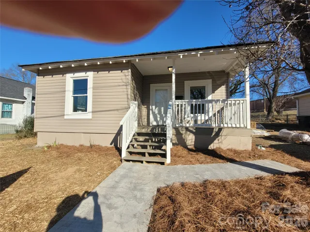 a view of a house with a patio