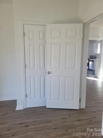 a view of a livingroom with wooden floor