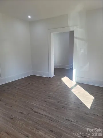 a view of wooden floor in an empty room