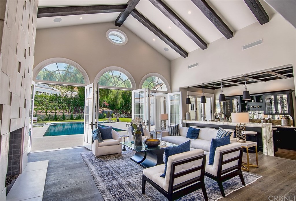 5546 Jed Smith Road Hidden Hills, CA 91302 - Photo 11 of 75 a living room with furniture and a large window