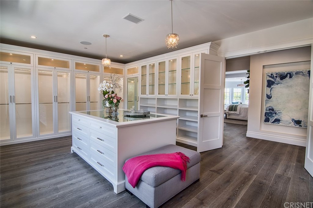 5546 Jed Smith Road Hidden Hills, CA 91302 - Photo 30 of 75 a kitchen with a refrigerator and wooden floor