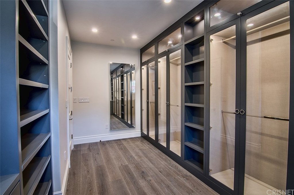 5546 Jed Smith Road Hidden Hills, CA 91302 - Photo 31 of 75 a view of walk in closet with empty racks