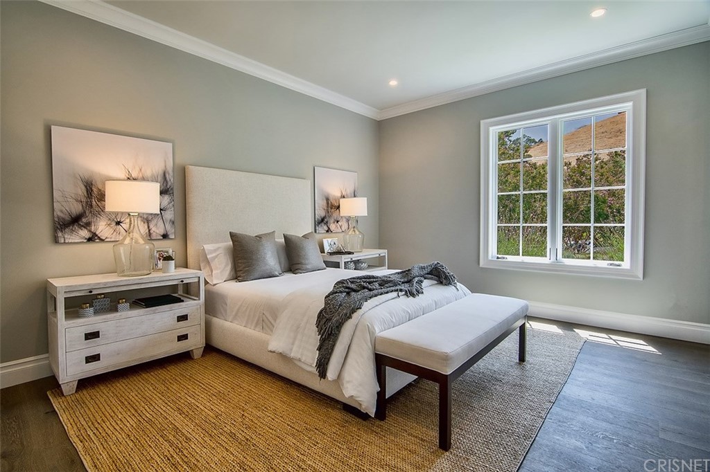 5546 Jed Smith Road Hidden Hills, CA 91302 - Photo 37 of 75 a bed room with a bed and a window