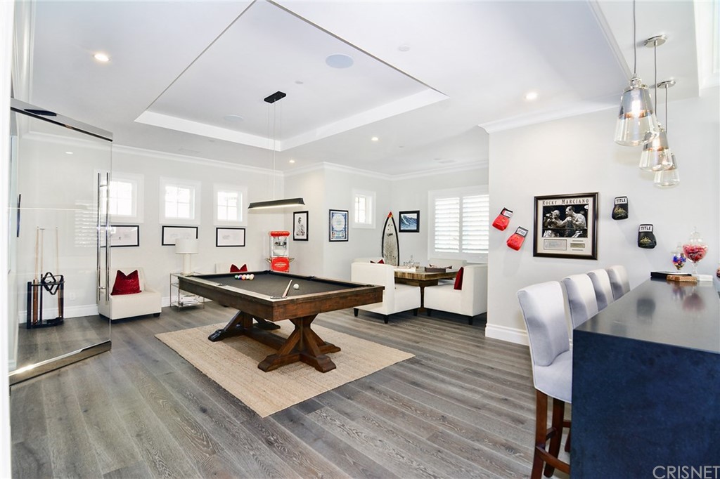 5546 Jed Smith Road Hidden Hills, CA 91302 - Photo 41 of 75 a living room with furniture and wooden floor