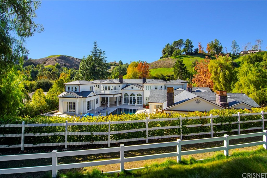 5546 Jed Smith Road Hidden Hills, CA 91302 - Photo 53 of 75 a view of a building with a swimming pool and outdoor space