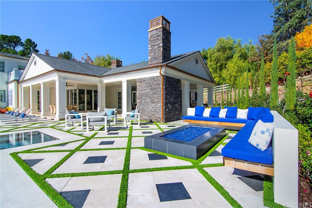 5546 Jed Smith Road Hidden Hills, CA 91302 - Photo 55 of 75 a view of a patio with swimming pool table and chairs