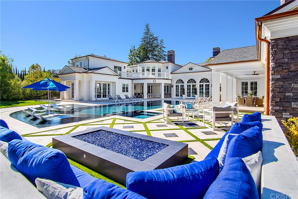 5546 Jed Smith Road Hidden Hills, CA 91302 - Photo 56 of 75 a view of a house with swimming pool and chairs