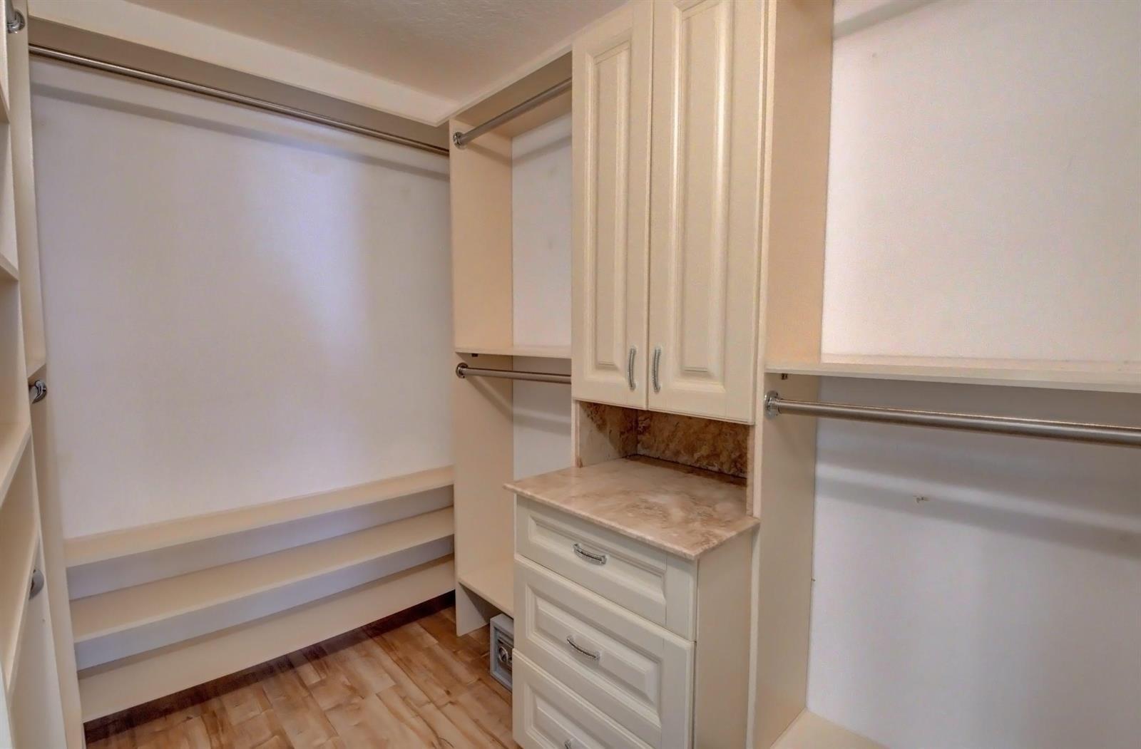 12920 Hyland Circle Boca Raton, FL 33428 - Photo 17 of 31 a view of walk in closet with empty racks