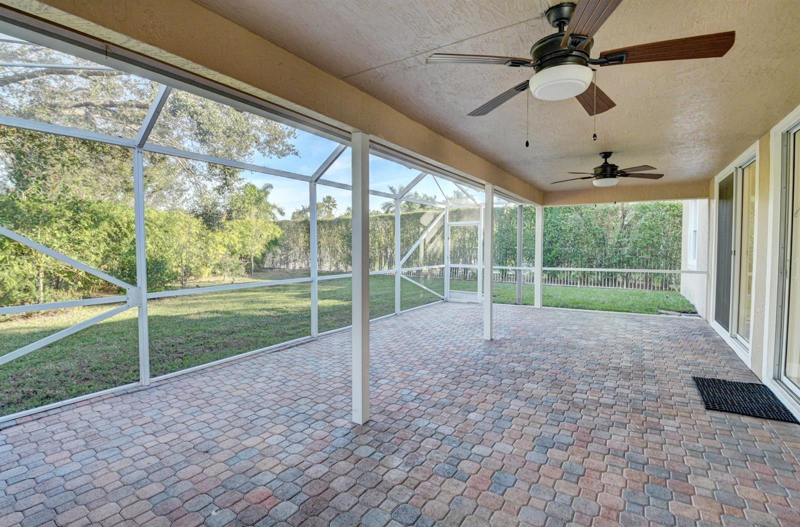 12920 Hyland Circle Boca Raton, FL 33428 - Photo 18 of 31 a view of a yard with porch
