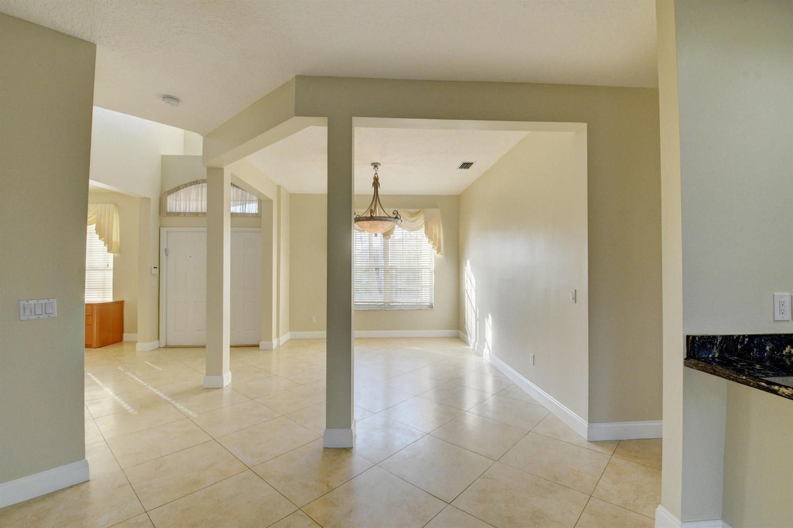 12920 Hyland Circle Boca Raton, FL 33428 - Photo 6 of 31 a bathroom with a shower and a glass door