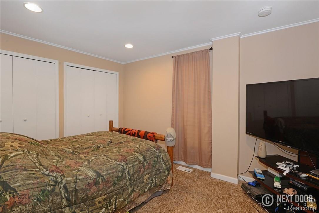 1426 Faussett Road Howell, MI 48855 - Photo 6 of 28 First floor bedroom with double closet