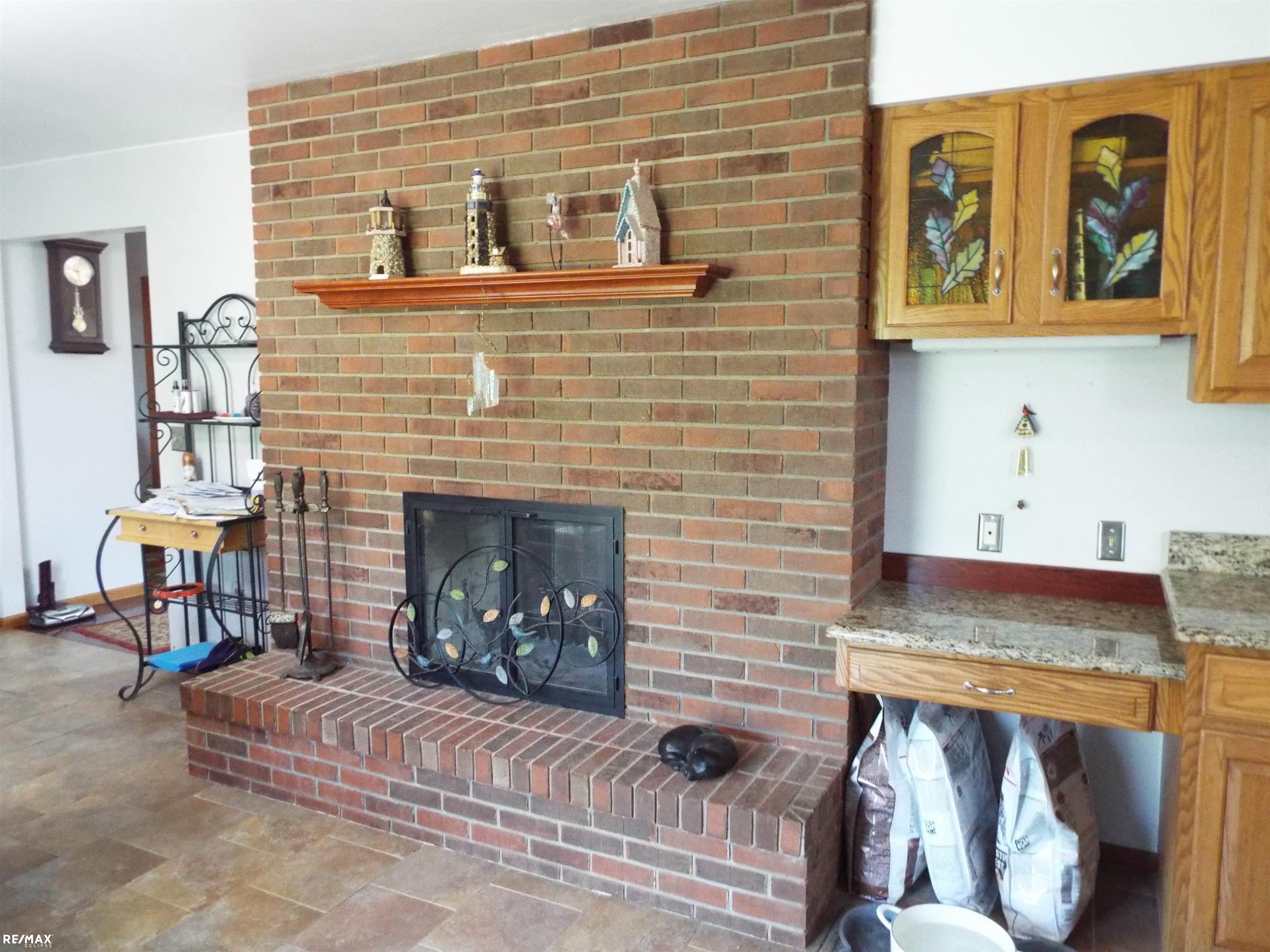 2299 North Lakeshore Road Carsonville, MI 48419 - Photo 14 of 31 Kitchen fireplace