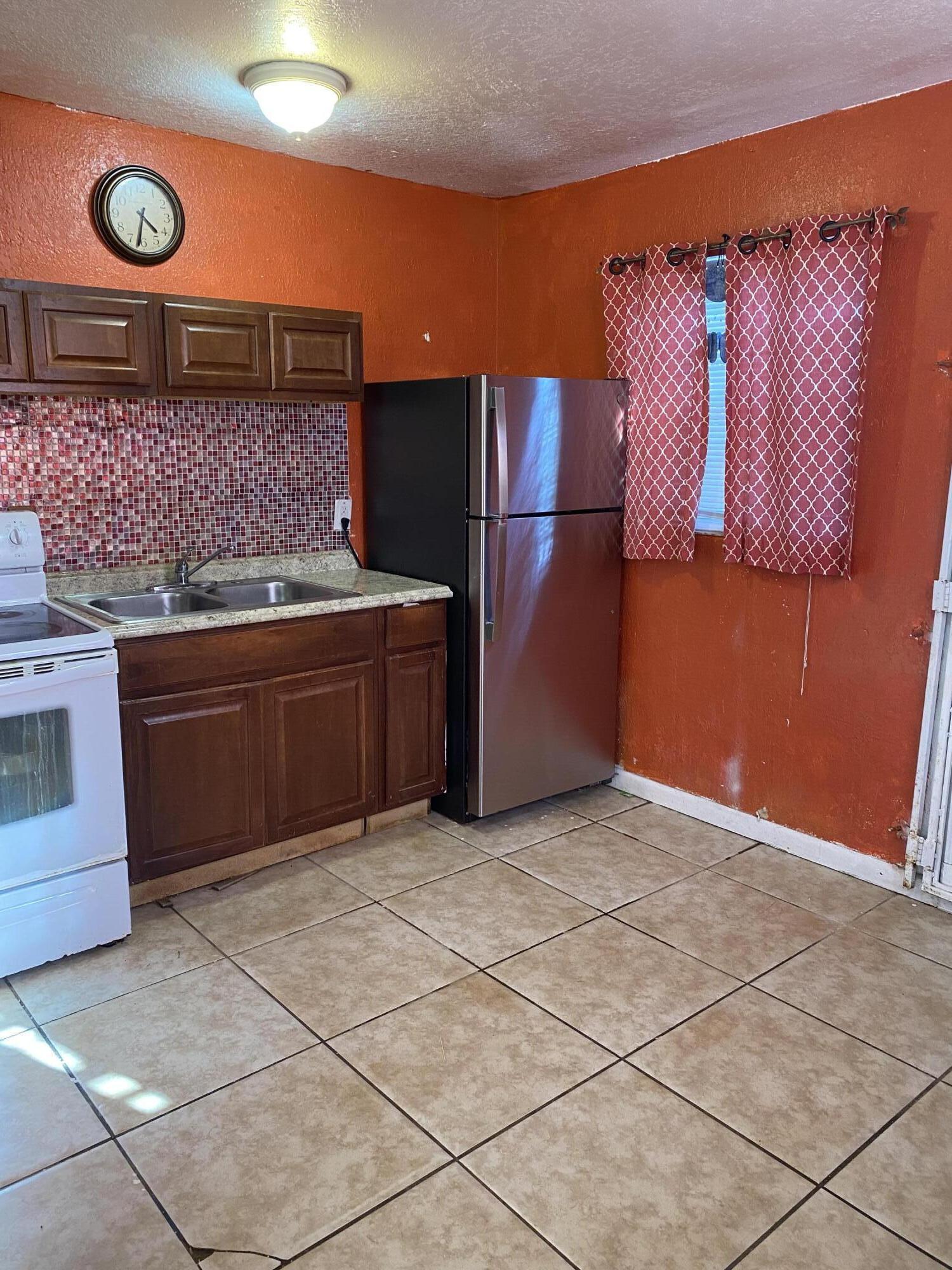 1357 West 34th Street Riviera Beach, FL 33404 - Photo 4 of 11 IMG-1788