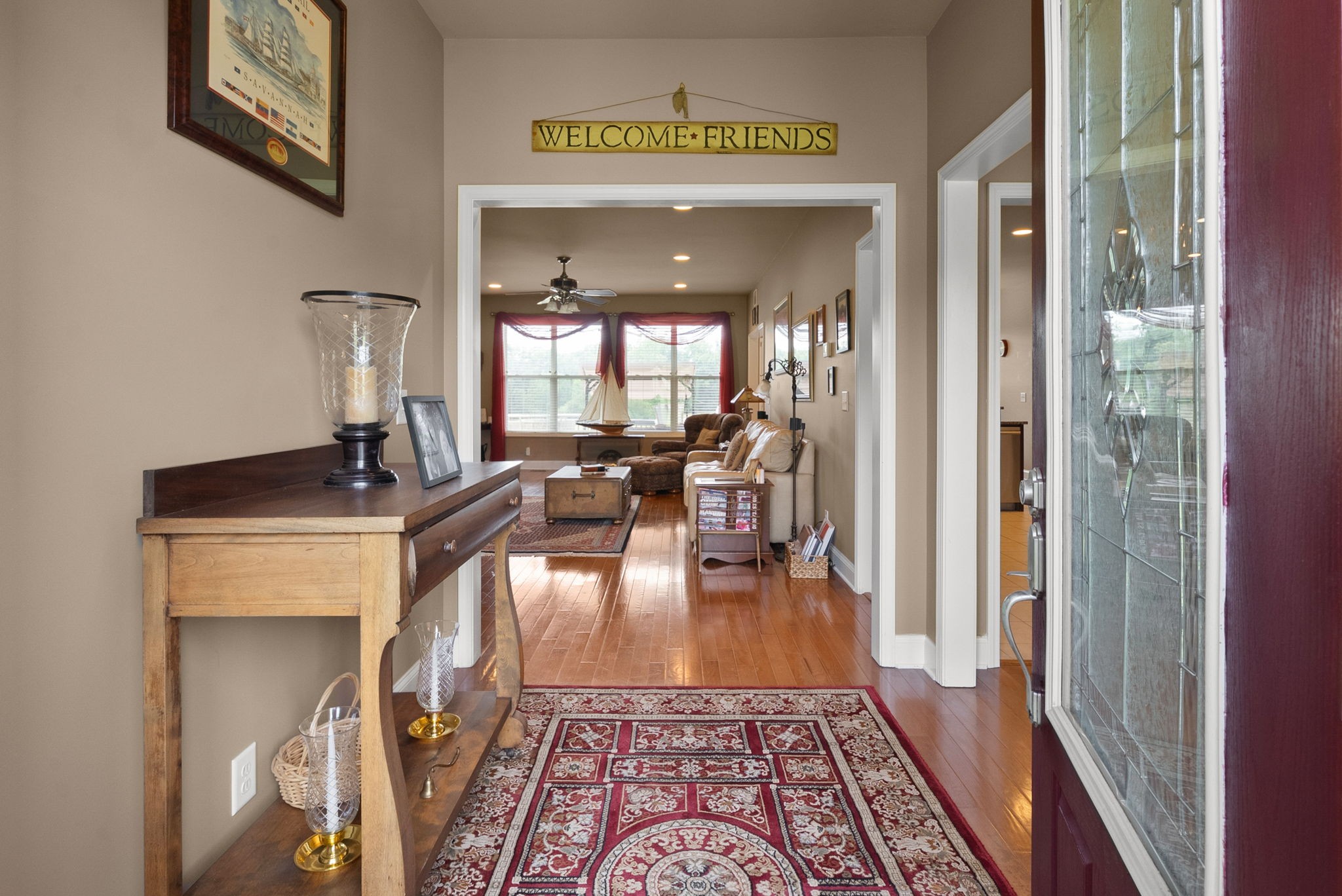 4940 Marion Road Cunningham, TN 37052 - Photo 4 of 43 a view of a hallway with wooden floor and furniture