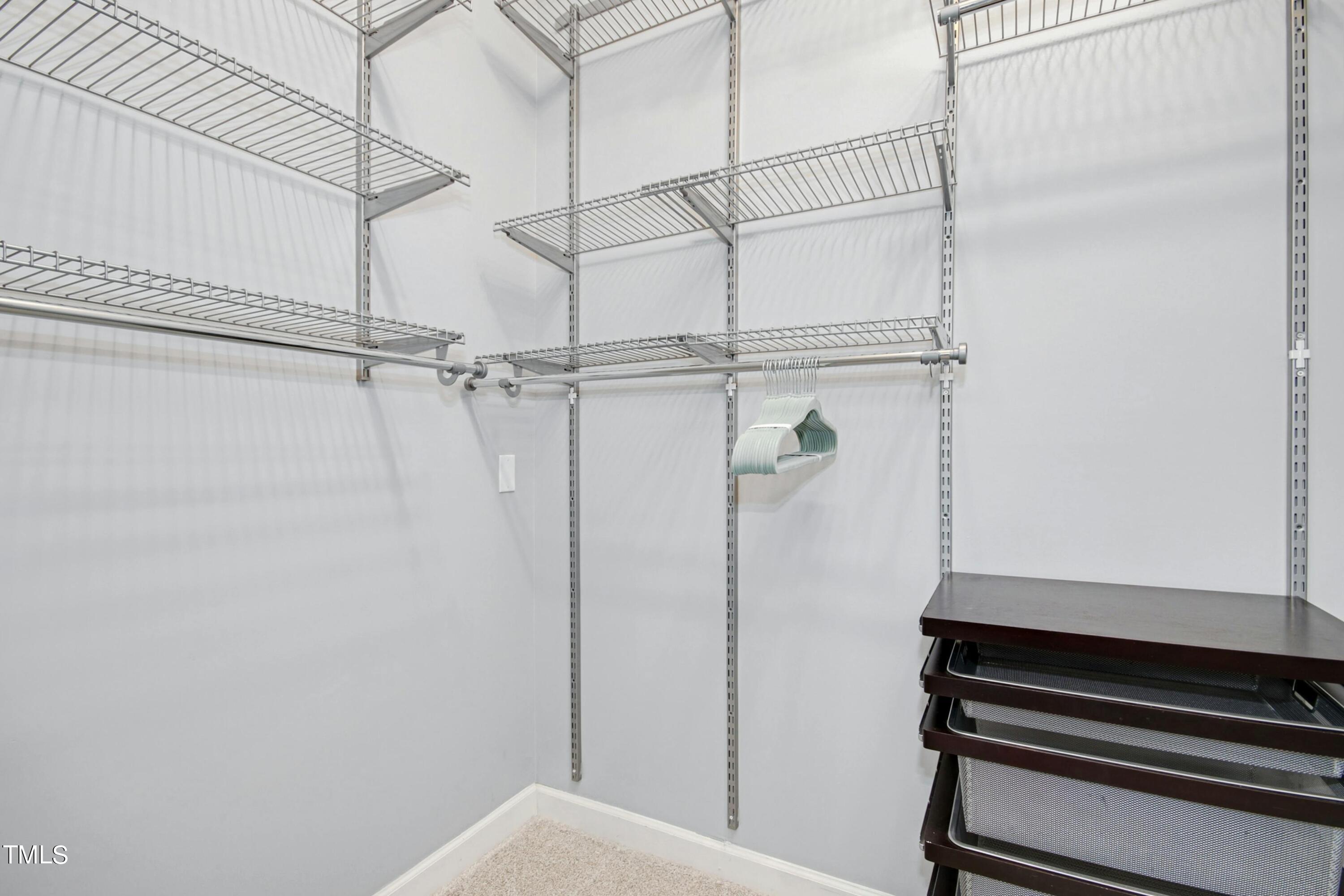 8605 Yucca Trail Raleigh, NC 27615 - Photo 24 of 42 a bathroom with a shower and toilet