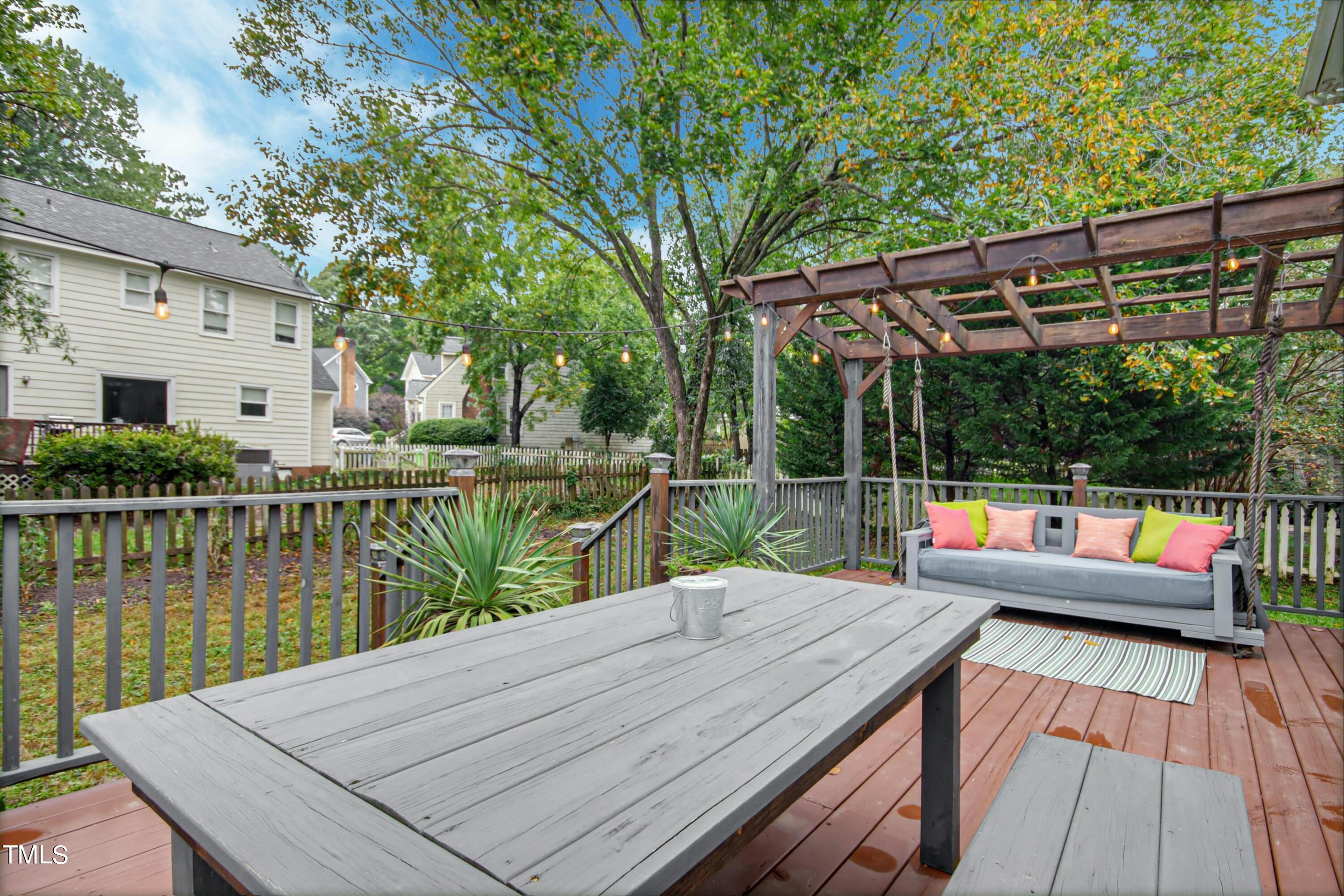 8605 Yucca Trail Raleigh, NC 27615 - Photo 30 of 42 a view of house with swimming pool and outdoor seating