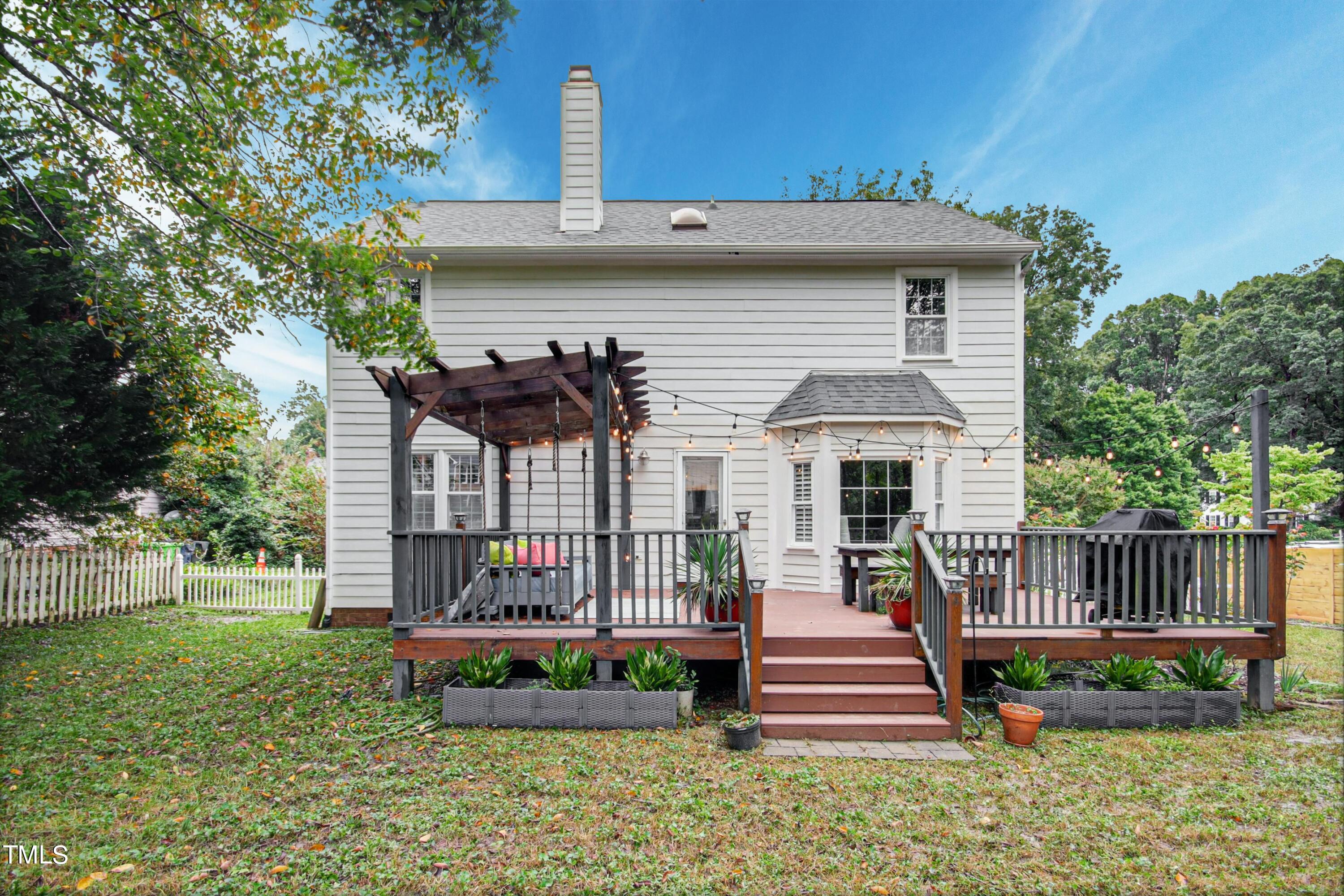 8605 Yucca Trail Raleigh, NC 27615 - Photo 35 of 42 a front view of a house with a yard