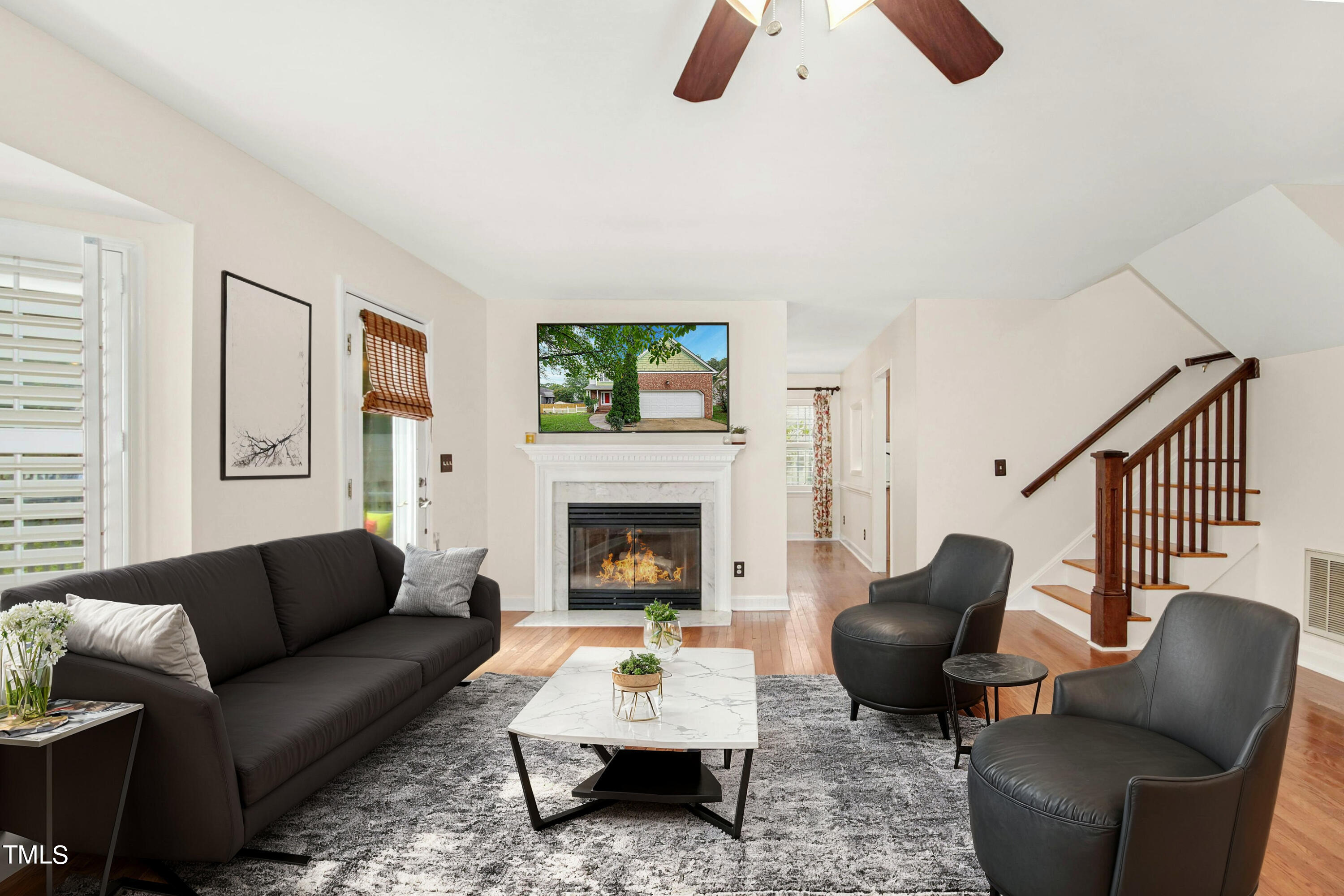 8605 Yucca Trail Raleigh, NC 27615 - Photo 4 of 42 a living room with furniture fireplace and window