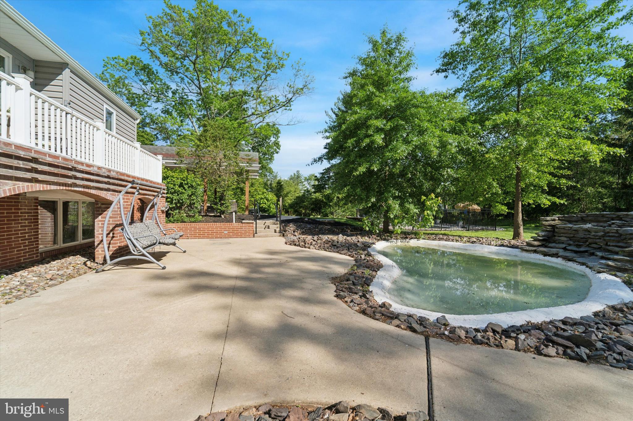 3370 Morris Road Lansdale, PA 19446 - Photo 45 of 60 Back patio w/ pond