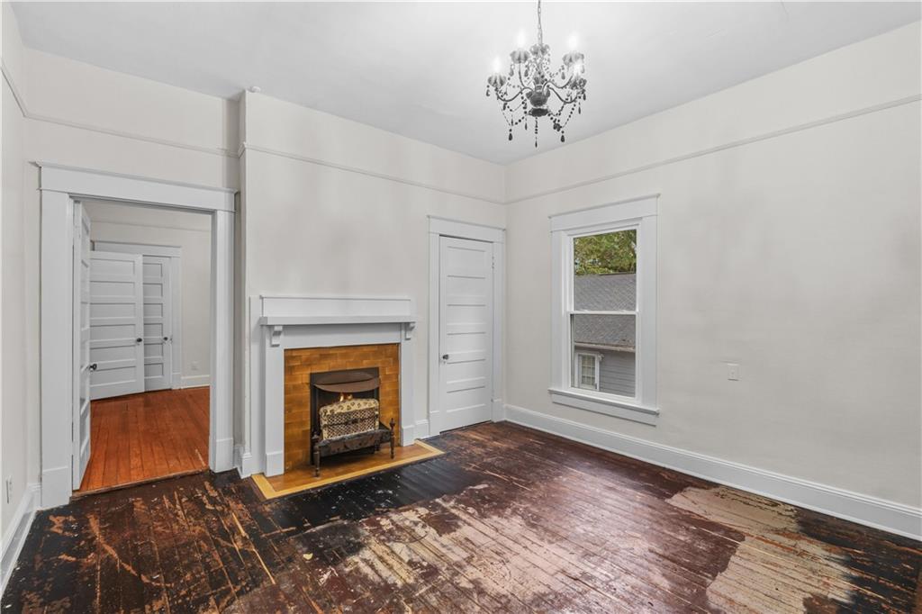 1440 Everhart Street Southwest Atlanta, GA 30310 - Photo 20 of 27 a view of a livingroom with a fireplace and window