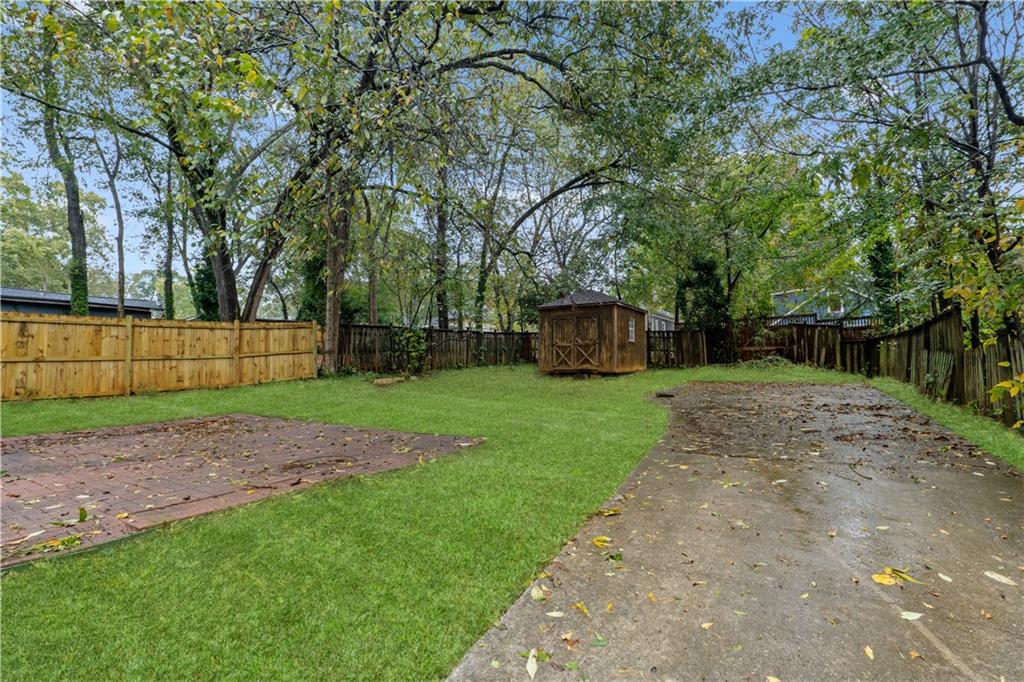 1440 Everhart Street Southwest Atlanta, GA 30310 - Photo 22 of 27 a view of a backyard with a garden