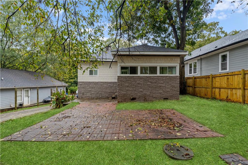 1440 Everhart Street Southwest Atlanta, GA 30310 - Photo 25 of 27 a view of a house with a yard