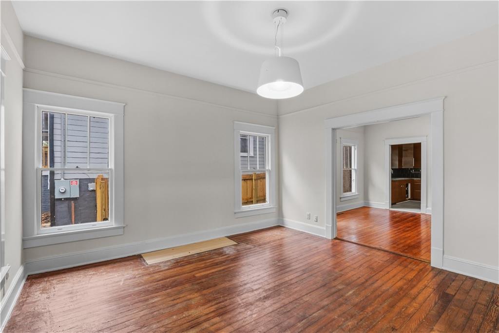 1440 Everhart Street Southwest Atlanta, GA 30310 - Photo 5 of 27 a view of livingroom with hardwood floor and window