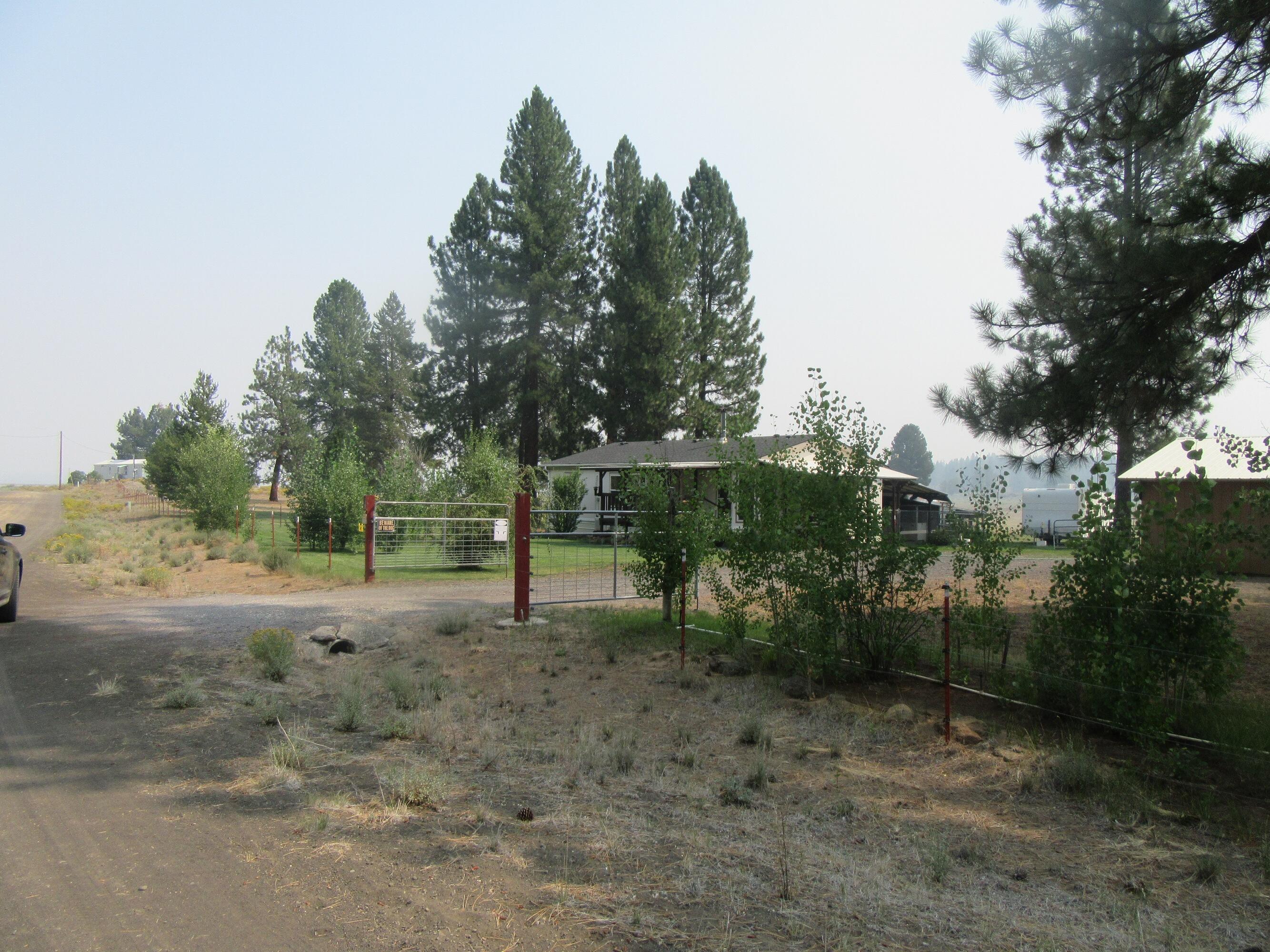 37187 Rollingwood Road Chiloquin, OR 97624 - Photo 24 of 33 Gate driveway into property