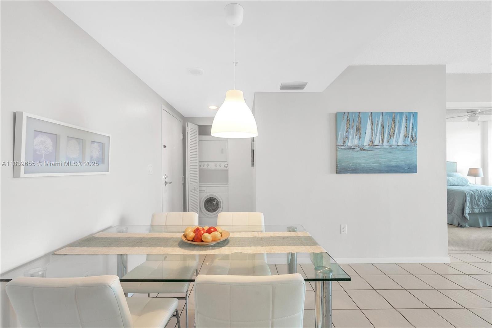 Brickell Miami, FL 33131 - Photo 26 of 32 a bathroom with a sink and a mirror