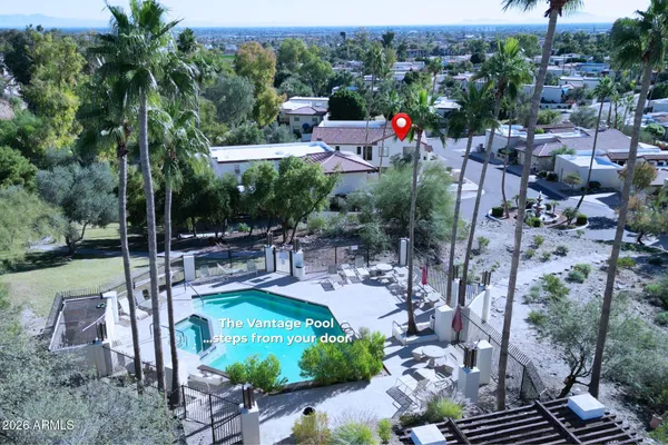 a view of a house with a yard from a patio