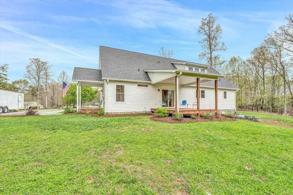 a house view with a garden space