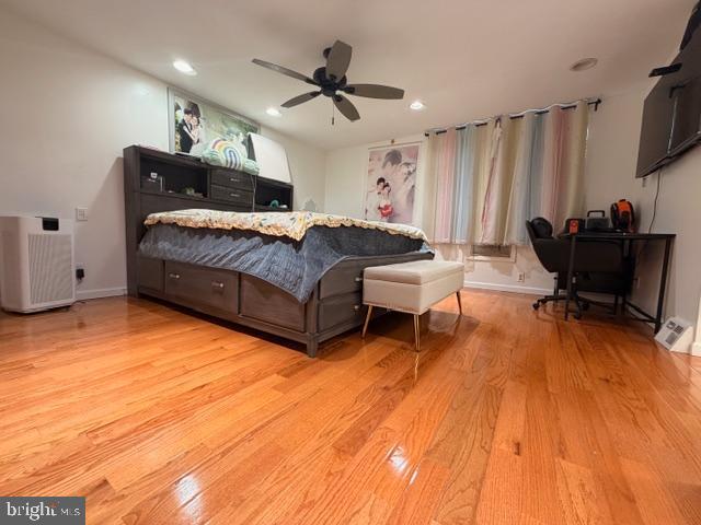 810 Kendrick Street Philadelphia, PA 19111 - Photo 20 of 45 a bedroom with furniture and a wooden floor
