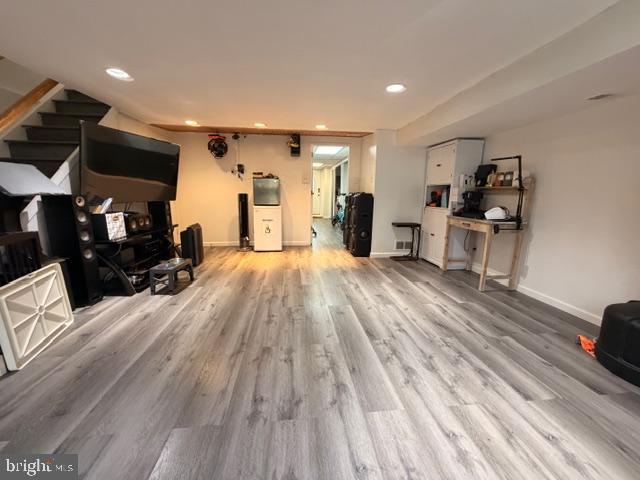 810 Kendrick Street Philadelphia, PA 19111 - Photo 33 of 45 a large room with stainless steel appliances lots of white furniture a window and a fireplace