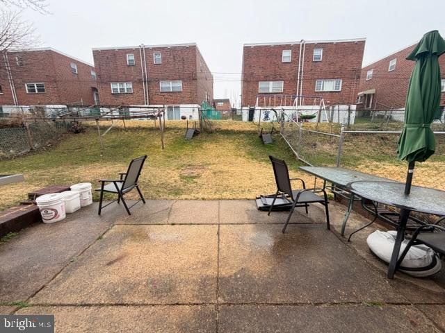 810 Kendrick Street Philadelphia, PA 19111 - Photo 43 of 45 a view of a lake with a chairs and table on the terrace
