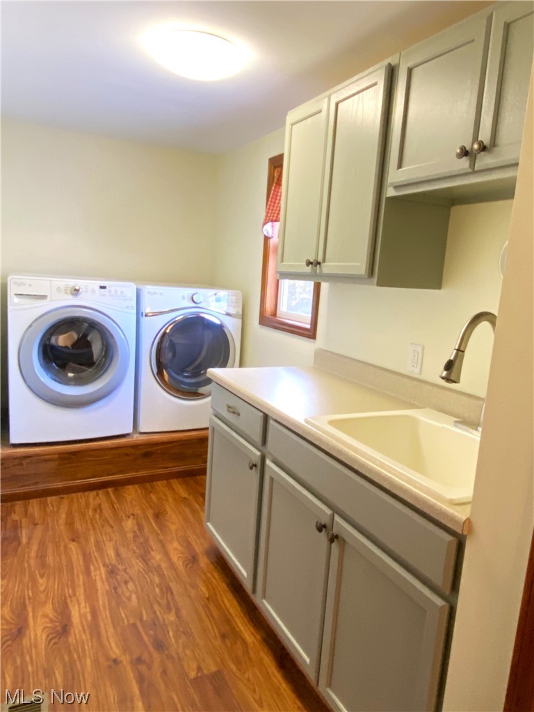 46948 Butternut Ridge Road Oberlin, OH 44074 - Photo 12 of 27 Utility room with sink & cabinets
