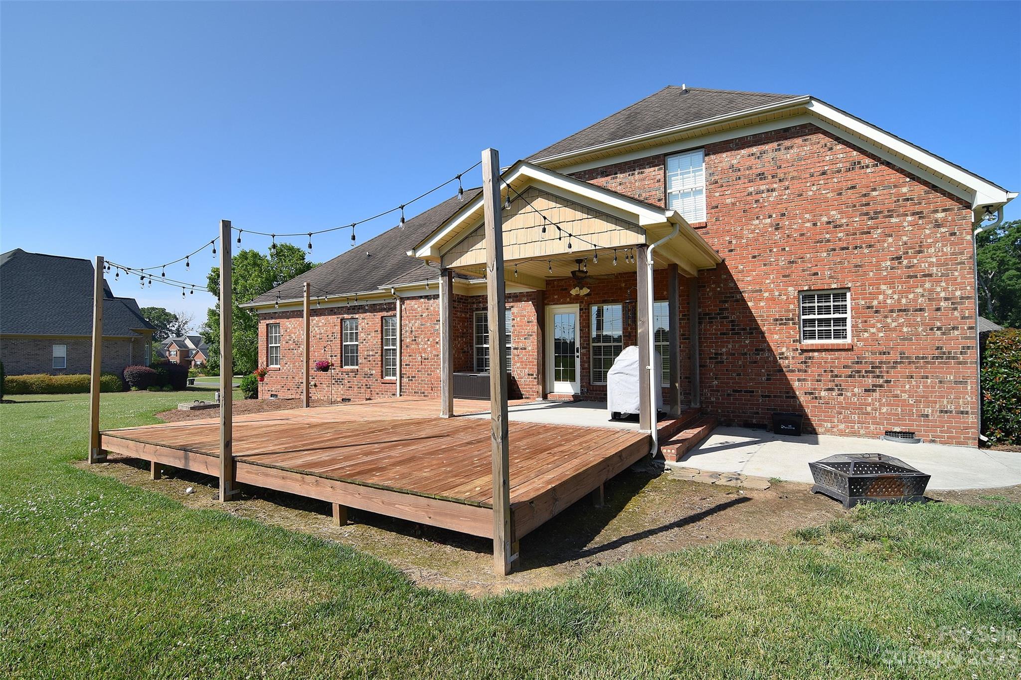 4913 Campobello Drive Monroe, NC 28110 - Photo 37 of 46 a view of a house with a backyard porch and sitting area